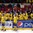 HELSINKI, FINLAND - JANUARY 2: Sweden's Joel Eriksson Ek #20 high fives the bench with Carl Grundstrom #16 and Marcus Pettersson #7 after scoring a first period goal during quarterfinal round action at the 2016 IIHF World Junior Championship. (Photo by Andrea Cardin/HHOF-IIHF Images)

